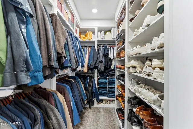 a room with gym equipment and windows