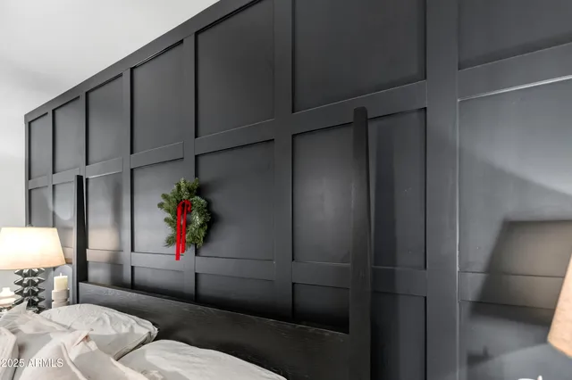 a kitchen with stainless steel appliances kitchen island granite countertop a refrigerator and a sink