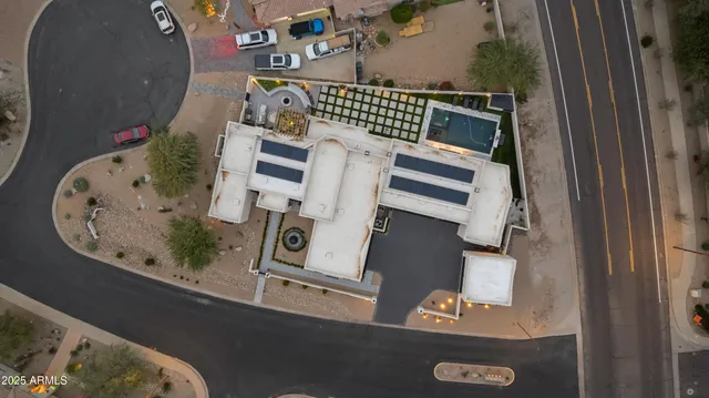 a room with a cabinets and refrigerator