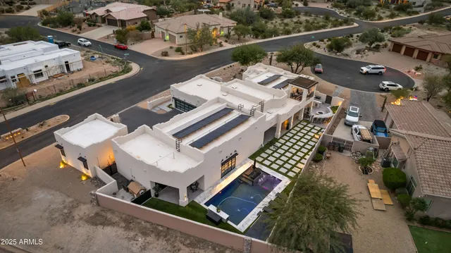 a kitchen with stainless steel appliances granite countertop a stove and cabinets