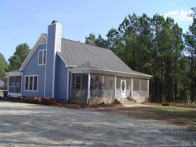 6421 Mal Weathers Road Raleigh, NC 27603 - Photo 1 of 1 a front view of a house with a yard