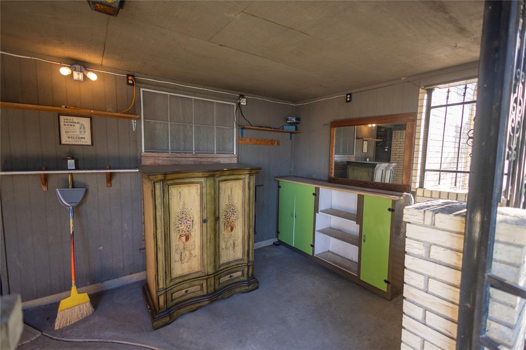 809 Lomo Street Fort Worth, TX 76110 - Photo 31 of 31 a kitchen with refrigerator and window