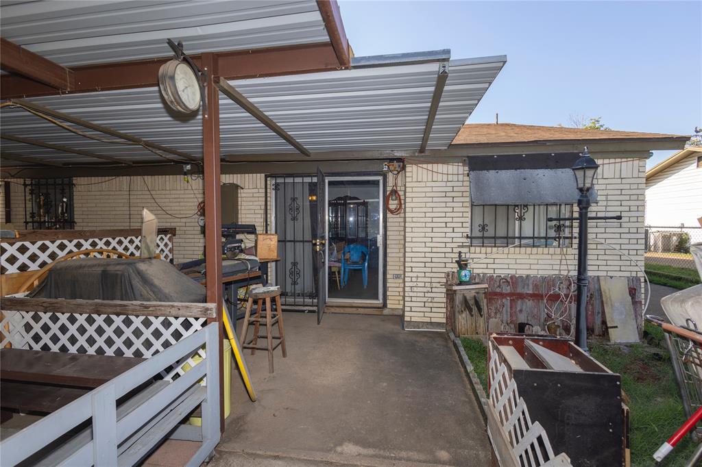 809 Lomo Street Fort Worth, TX 76110 - Photo 4 of 31 a view of a storage & utility room