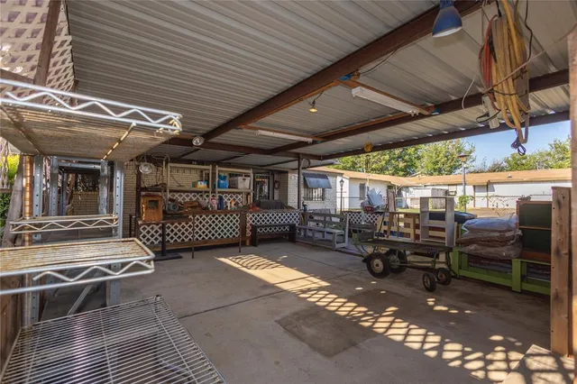 a view of a garage with chairs