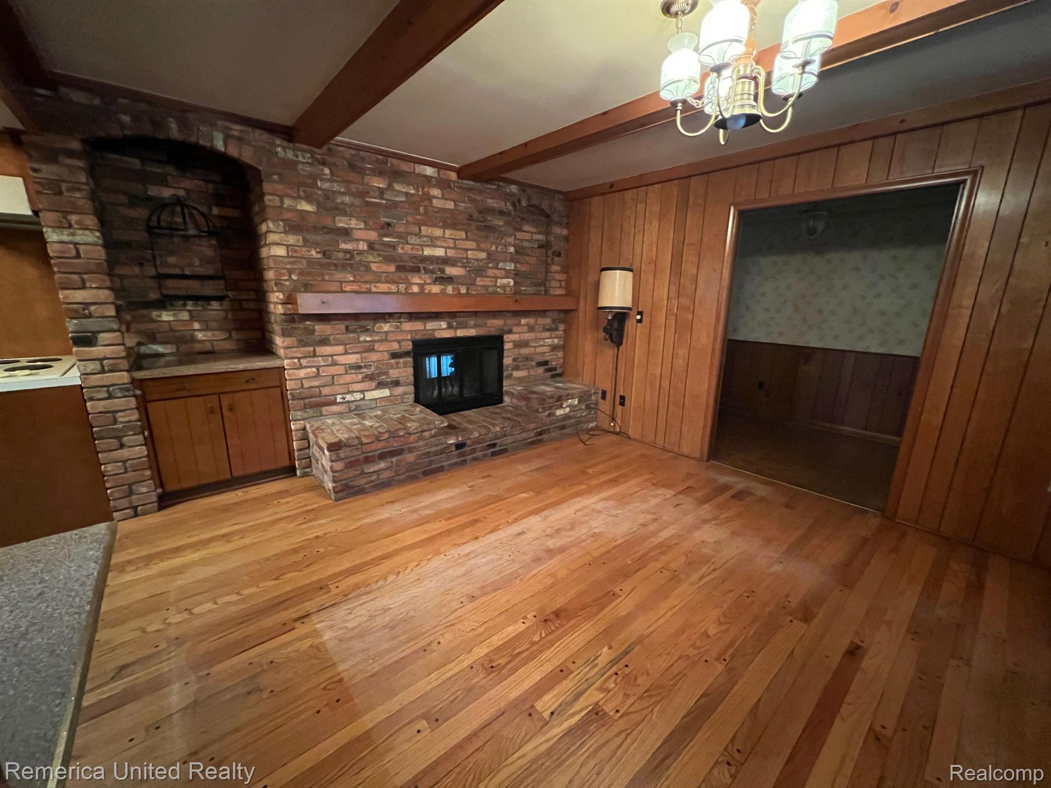 3340 Musson Road Howell, MI 48855 - Photo 8 of 45 Dining room 2 sided fireplace