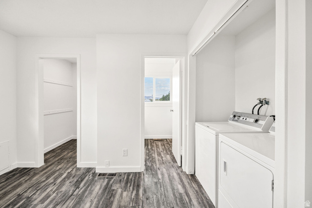 4155 Johnson Road Nibley, UT 84321 - Photo 15 of 71 Laundry area featuring dark wood-style flooring and independent washer and dryer