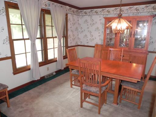 5N485 Oak Road St. Charles, IL 60175 - Photo 4 of 16 a view of a dining room with furniture and a window