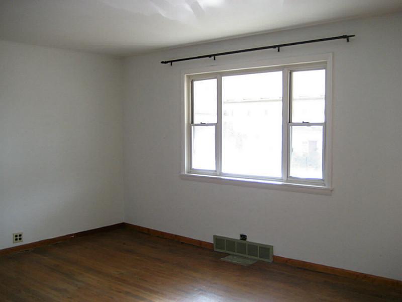 435 Miller Avenue Butler, PA 16001 - Photo 4 of 21 Living Room. Note living room has since been carpeted but hardwood floors lie beneath!