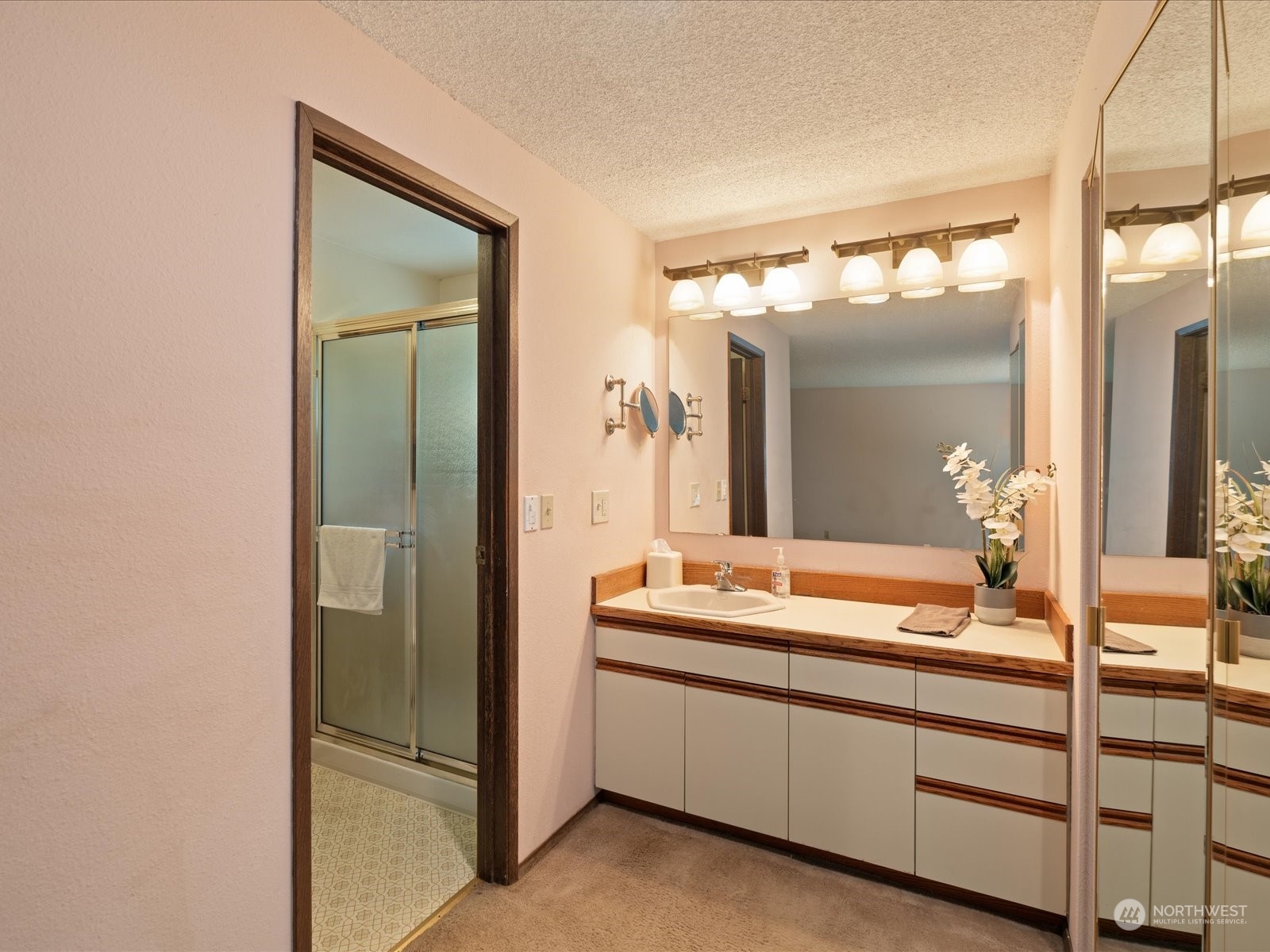 22211 49th Avenue Southeast Bothell, WA 98021 - Photo 14 of 37 a bathroom with a double vanity sink and mirror
