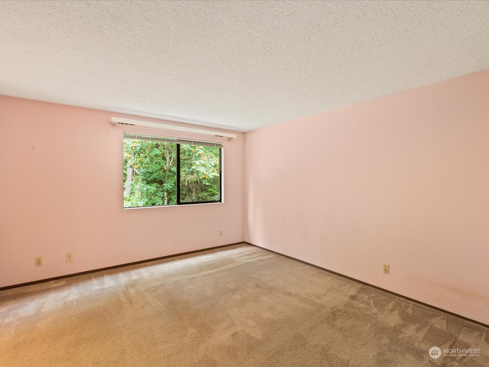 22211 49th Avenue Southeast Bothell, WA 98021 - Photo 15 of 37 a view of an empty room with a window