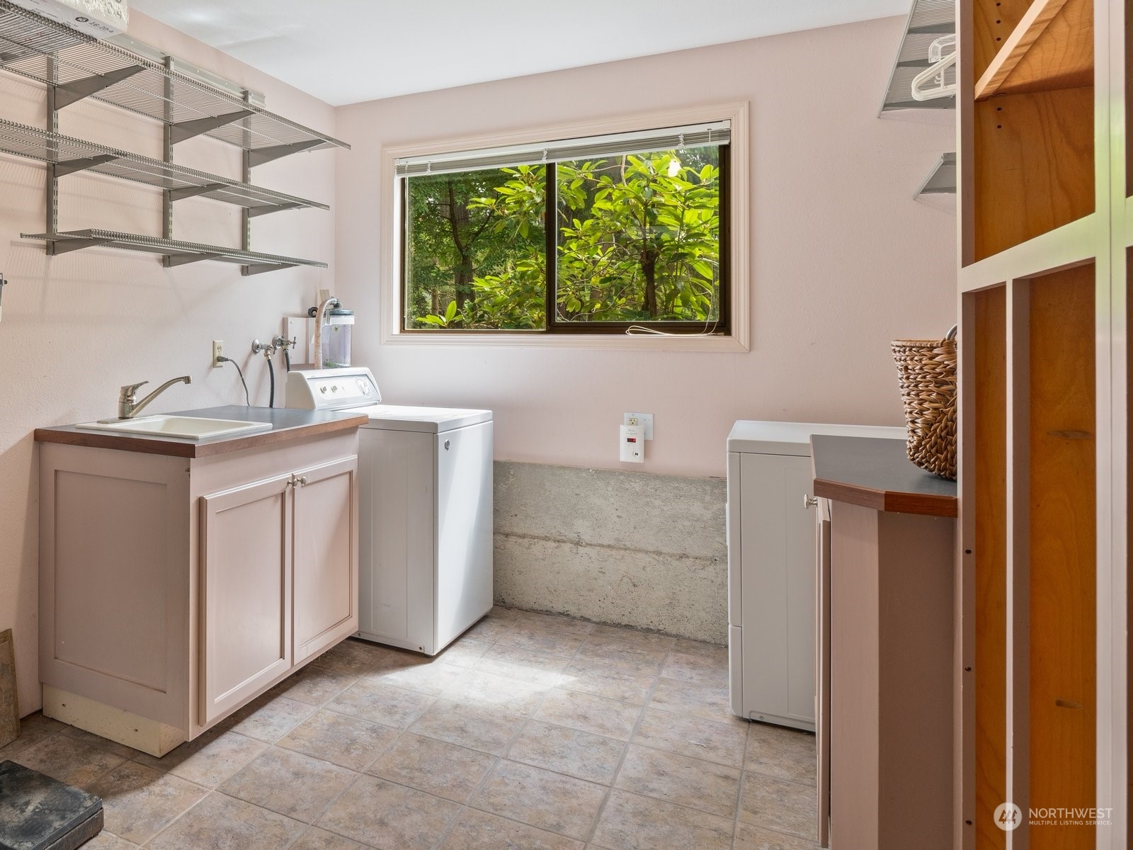 22211 49th Avenue Southeast Bothell, WA 98021 - Photo 26 of 37 a room with a stove and a refrigerator