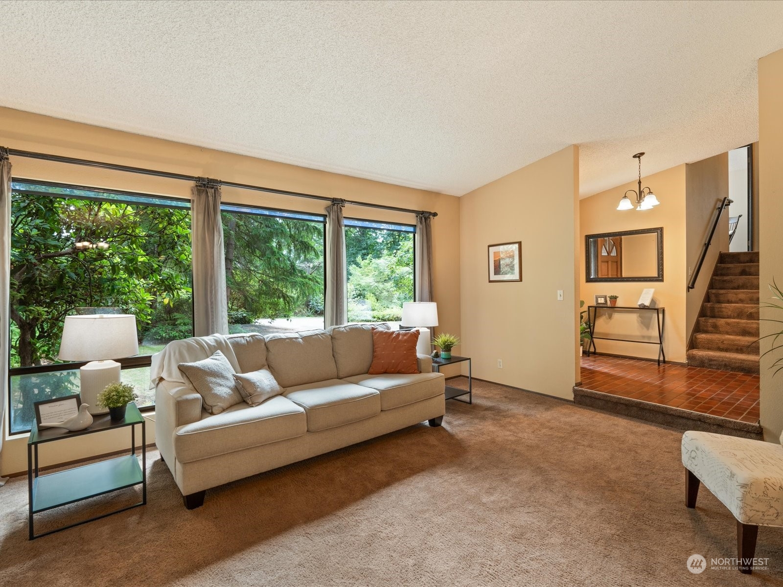 22211 49th Avenue Southeast Bothell, WA 98021 - Photo 6 of 37 a living room with furniture and a window