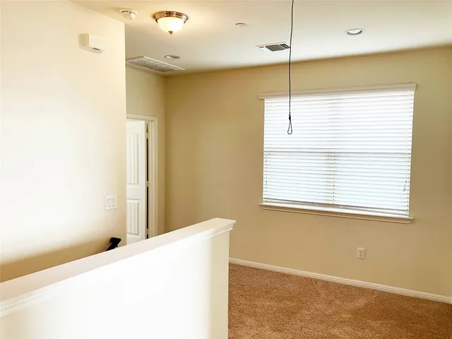 a swimming pool with outdoor seating and yard