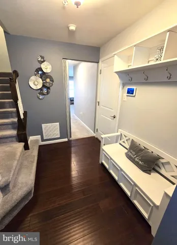 a very nice looking room with wooden floor