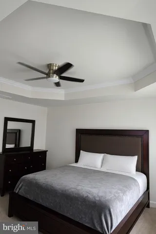 a view of an empty room with a cabinet