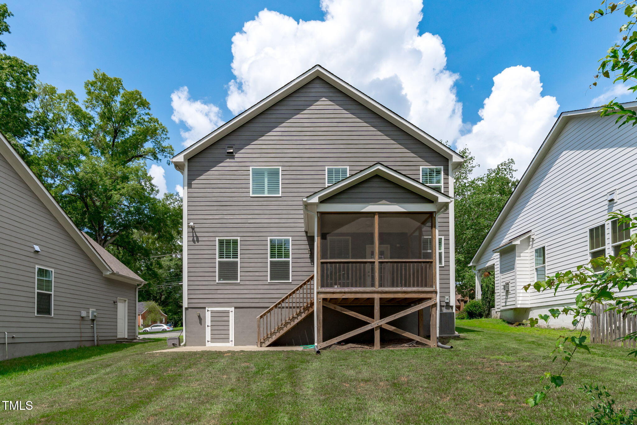 409 Morreene Road Durham, NC 27705 - Photo 29 of 30 a view of a house with a yard