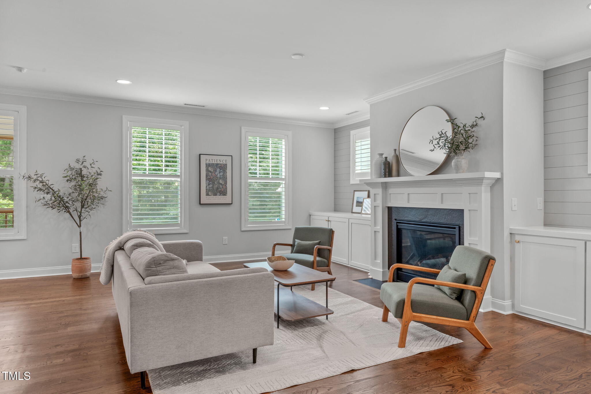 409 Morreene Road Durham, NC 27705 - Photo 7 of 30 a living room with furniture and a fireplace