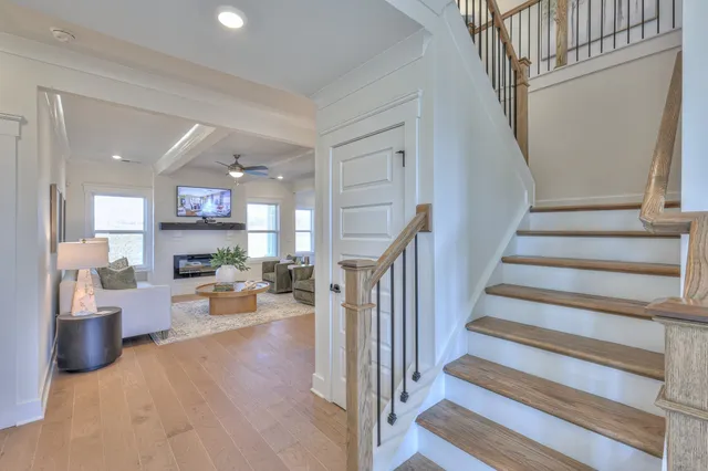 a view of a living room and entryway
