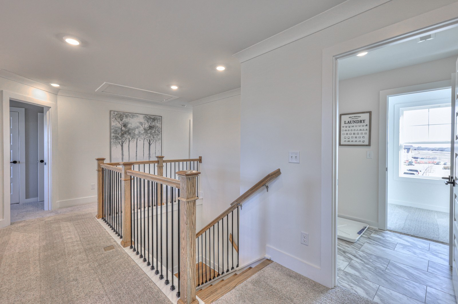 2846 Bluestem Road Columbia, TN 38401 - Photo 14 of 28 a view of a hallway with wooden floor and windows