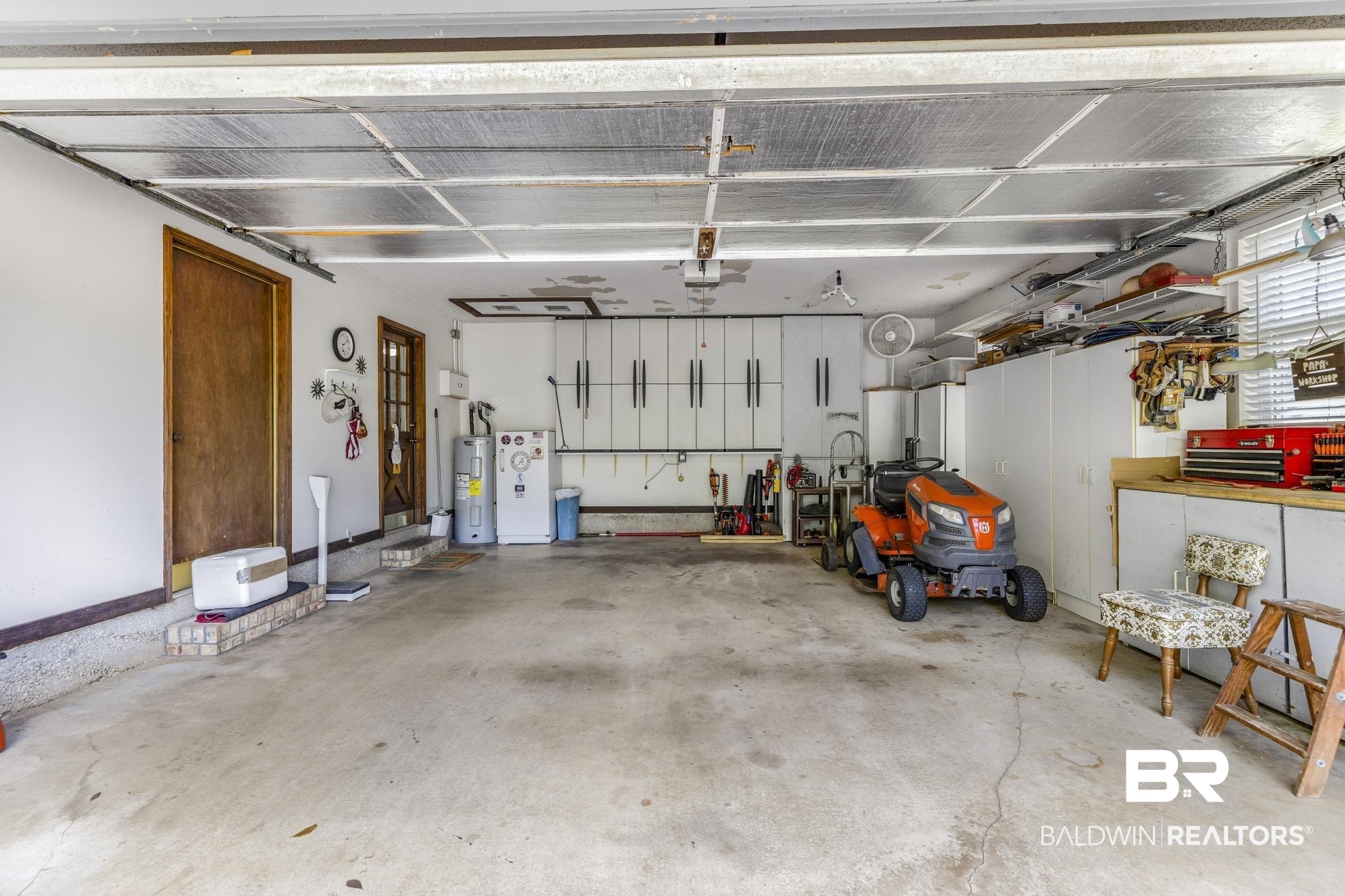 10207 Plantation Drive Daphne, AL 36526 - Photo 31 of 48 Garage featuring electric water heater and refrigerator