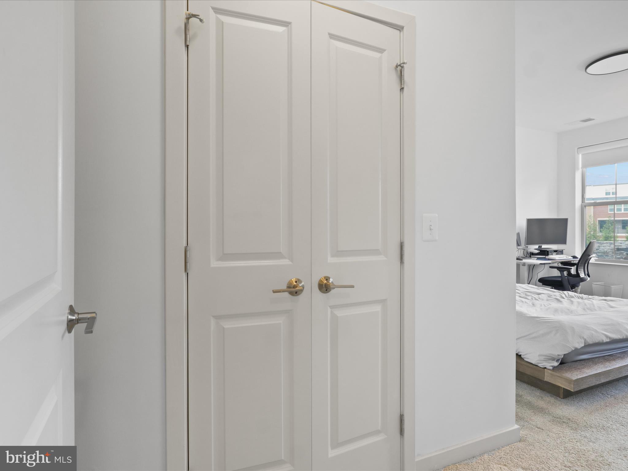 10755 Fairgrounds Drive, Unit 223 Fairfax, VA 22030 - Photo 15 of 28 a view of a bedroom from a hallway