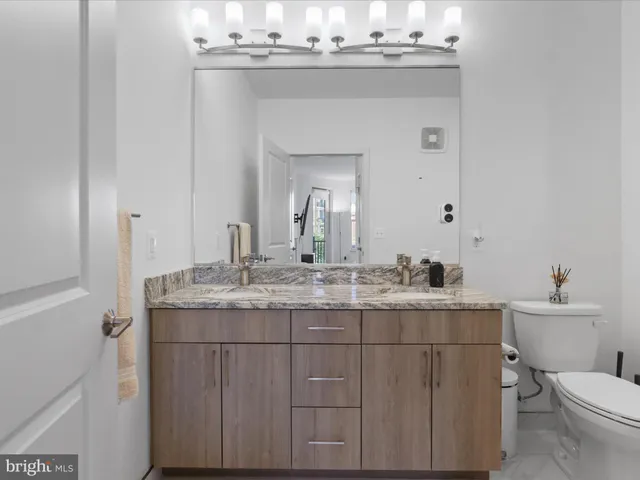 a bathroom with a shower and a toilet