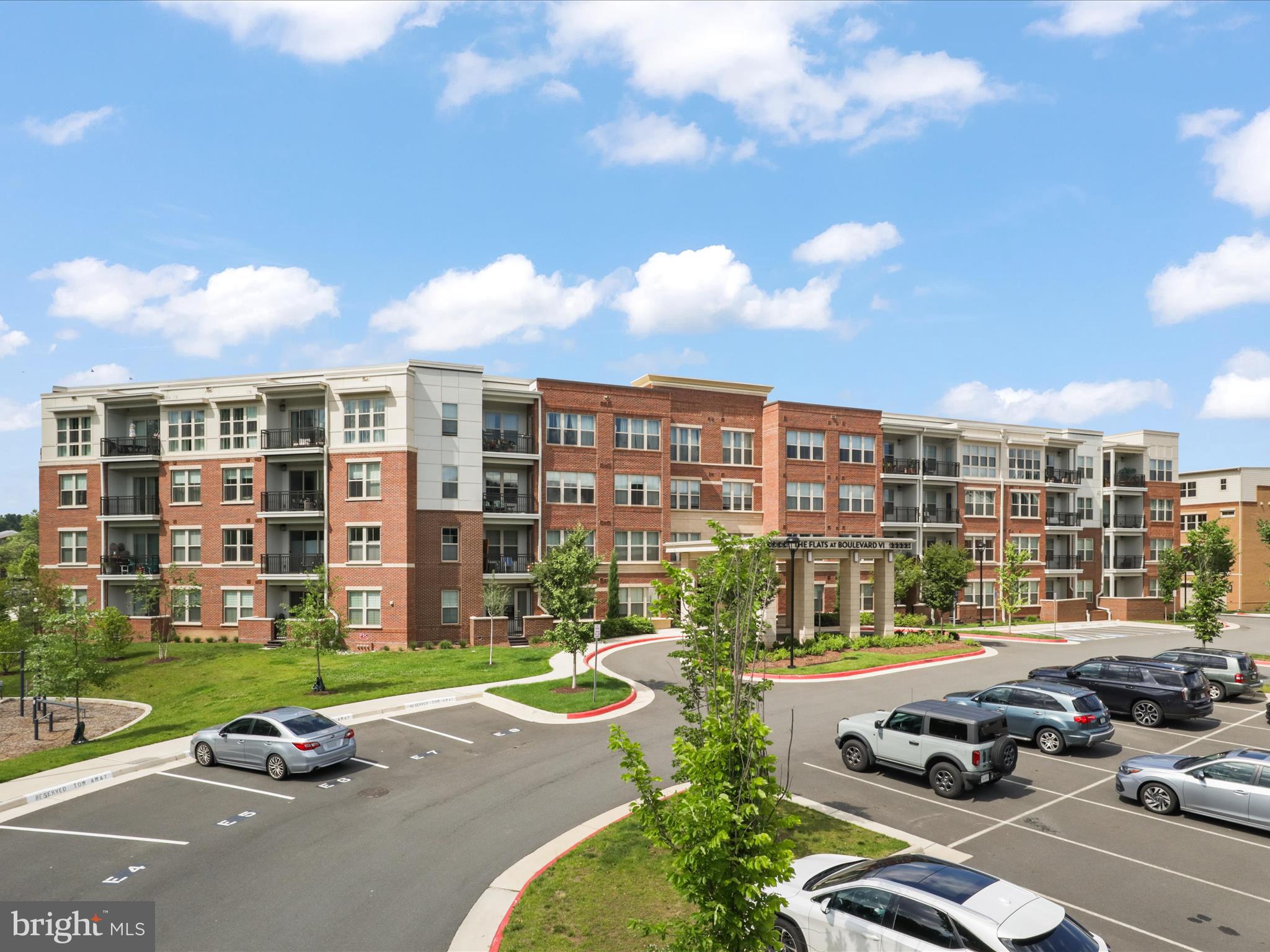 10755 Fairgrounds Drive, Unit 223 Fairfax, VA 22030 - Photo 3 of 28 a car parked in front of a building