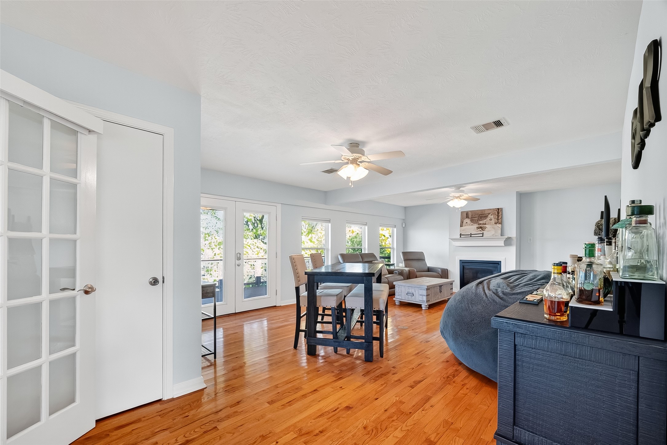 180 Grove Road Kemah, TX 77565 - Photo 11 of 50 a view of a dining room with furniture window and wooden floor