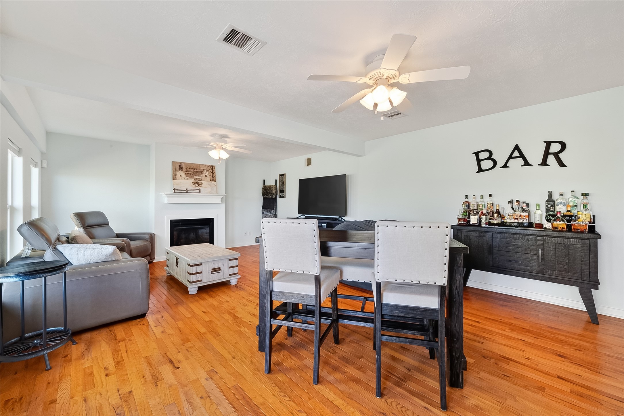 180 Grove Road Kemah, TX 77565 - Photo 12 of 50 a living room with furniture and a flat screen tv