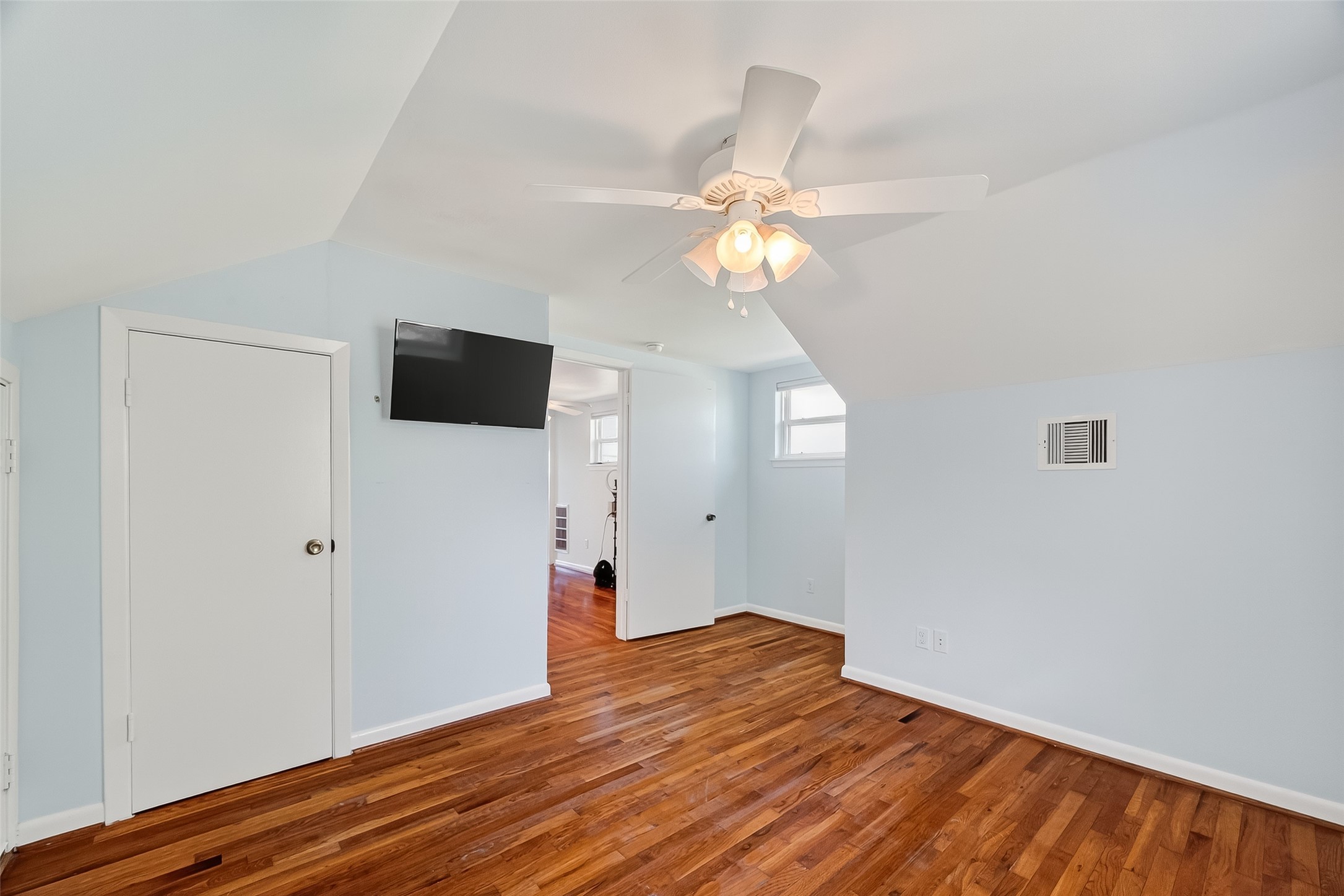 180 Grove Road Kemah, TX 77565 - Photo 29 of 50 wooden floor in an empty room with a window