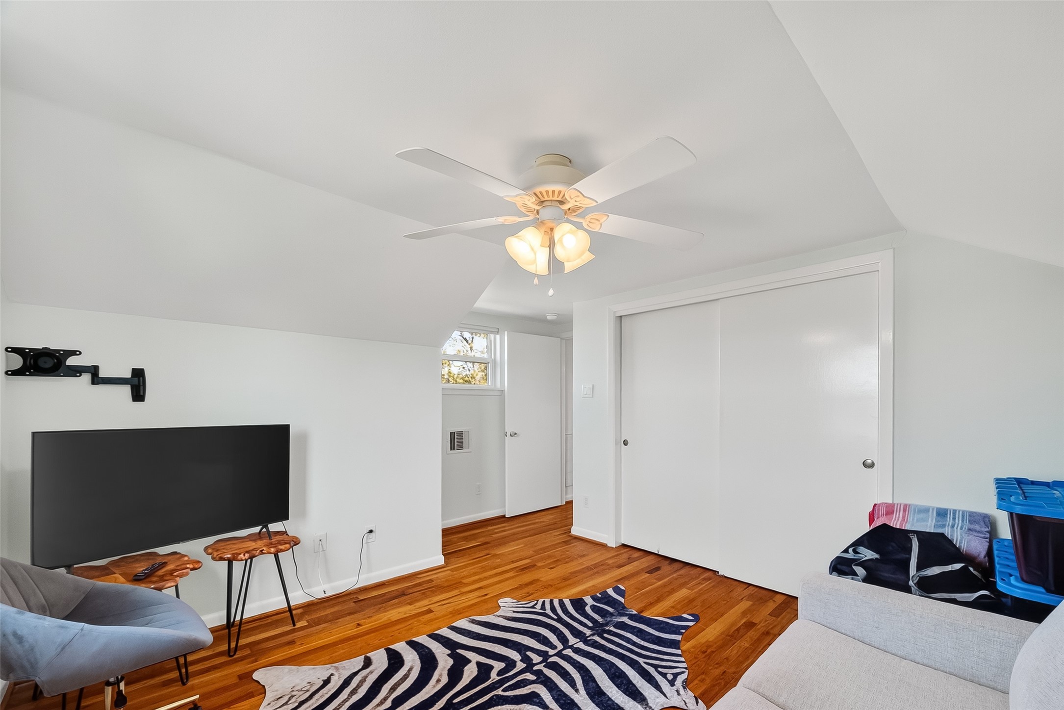 180 Grove Road Kemah, TX 77565 - Photo 32 of 50 a bedroom with a bed and a flat screen tv