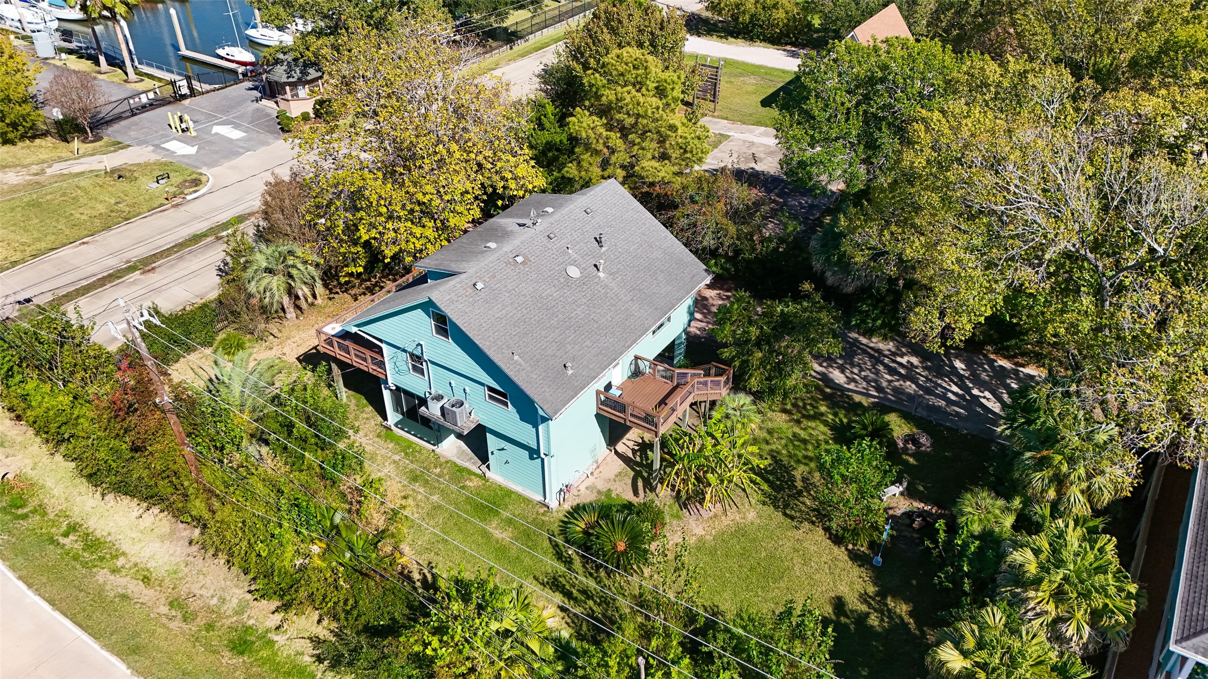 180 Grove Road Kemah, TX 77565 - Photo 47 of 50 view of a house with a yard