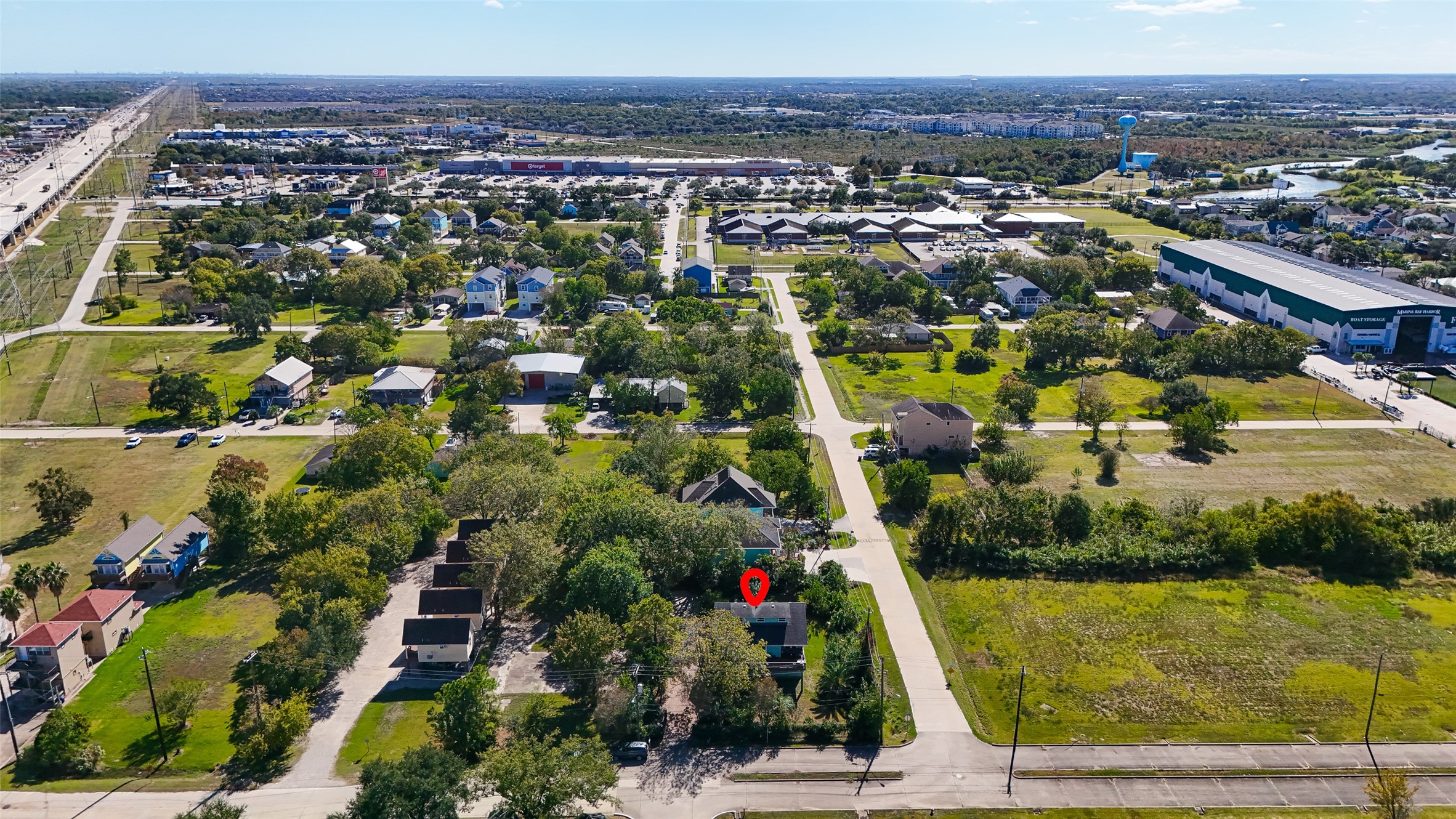 180 Grove Road Kemah, TX 77565 - Photo 48 of 50 an aerial view of residential houses with outdoor space and swimming pool