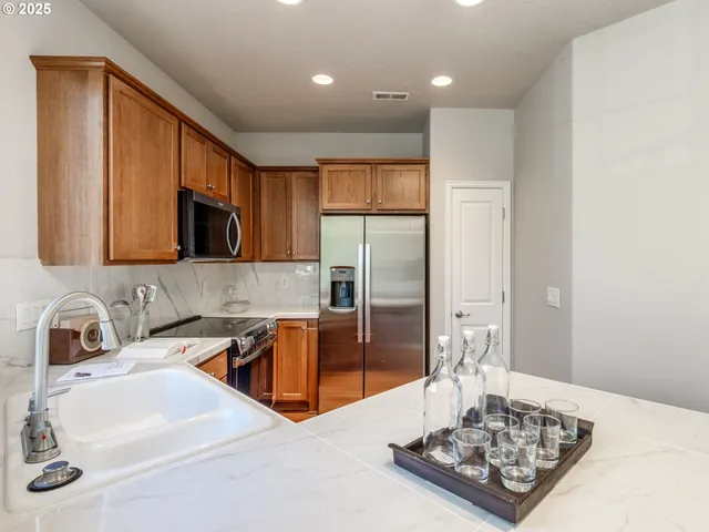 a view of a bathroom with a washer and dryer