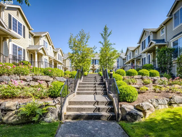 a view of a garden with pathway
