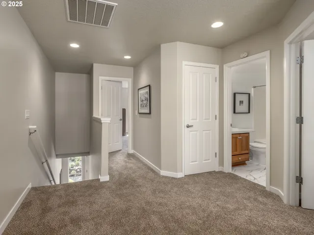 a view of a livingroom with wooden floor and closet