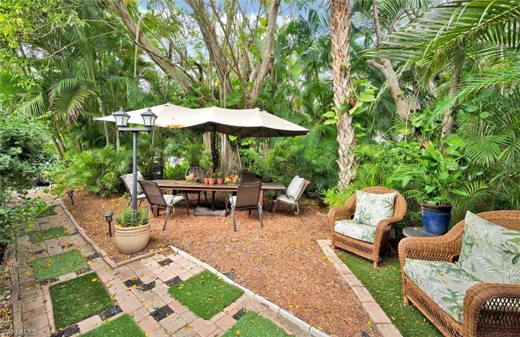1245 Solana Road Naples, FL 34103 - Photo 11 of 22 Potential for side yard off the kitchen