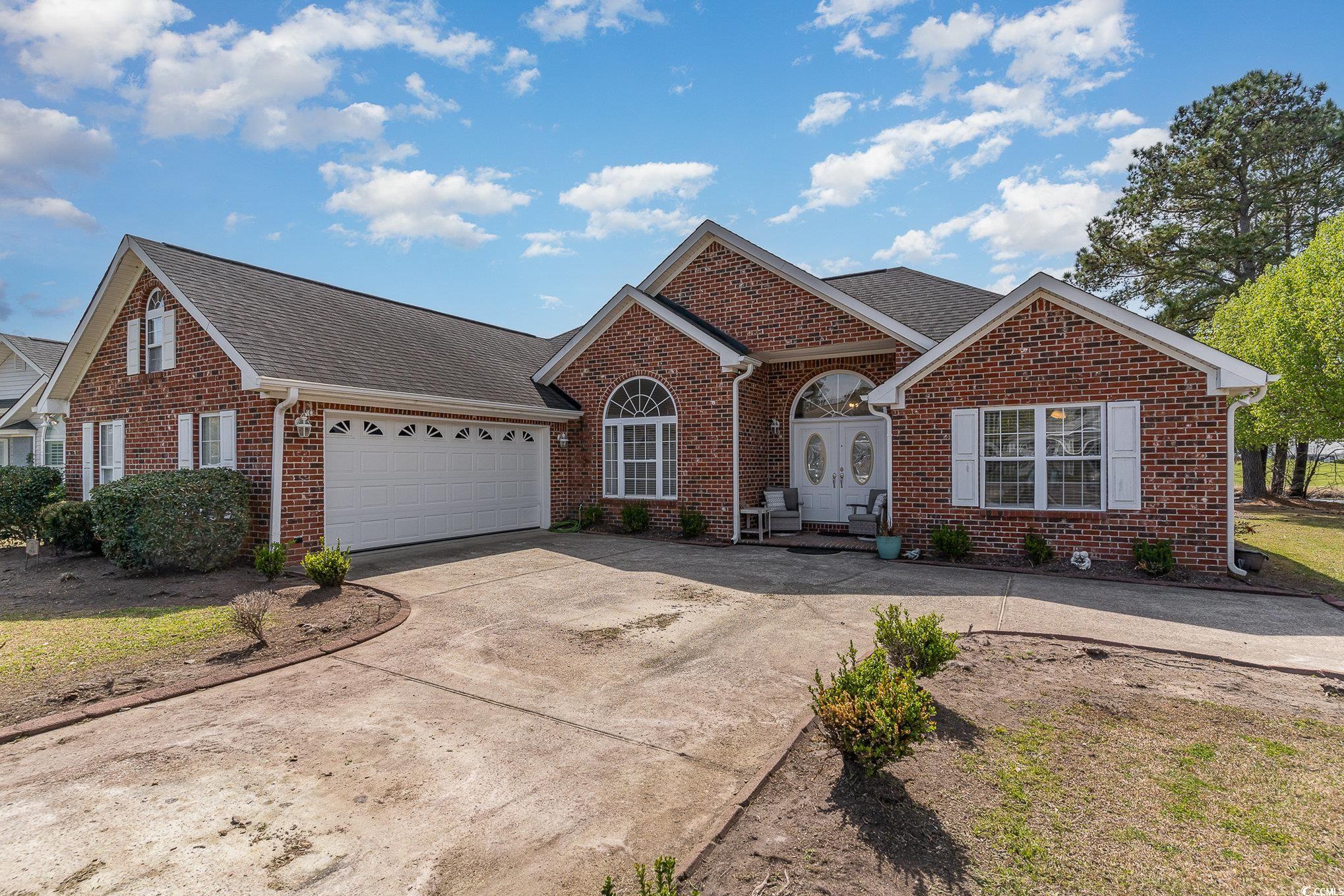 650 Bucks Trail Longs, SC 29568 - Photo 20 of 30 View of front facade featuring brick siding, a shi