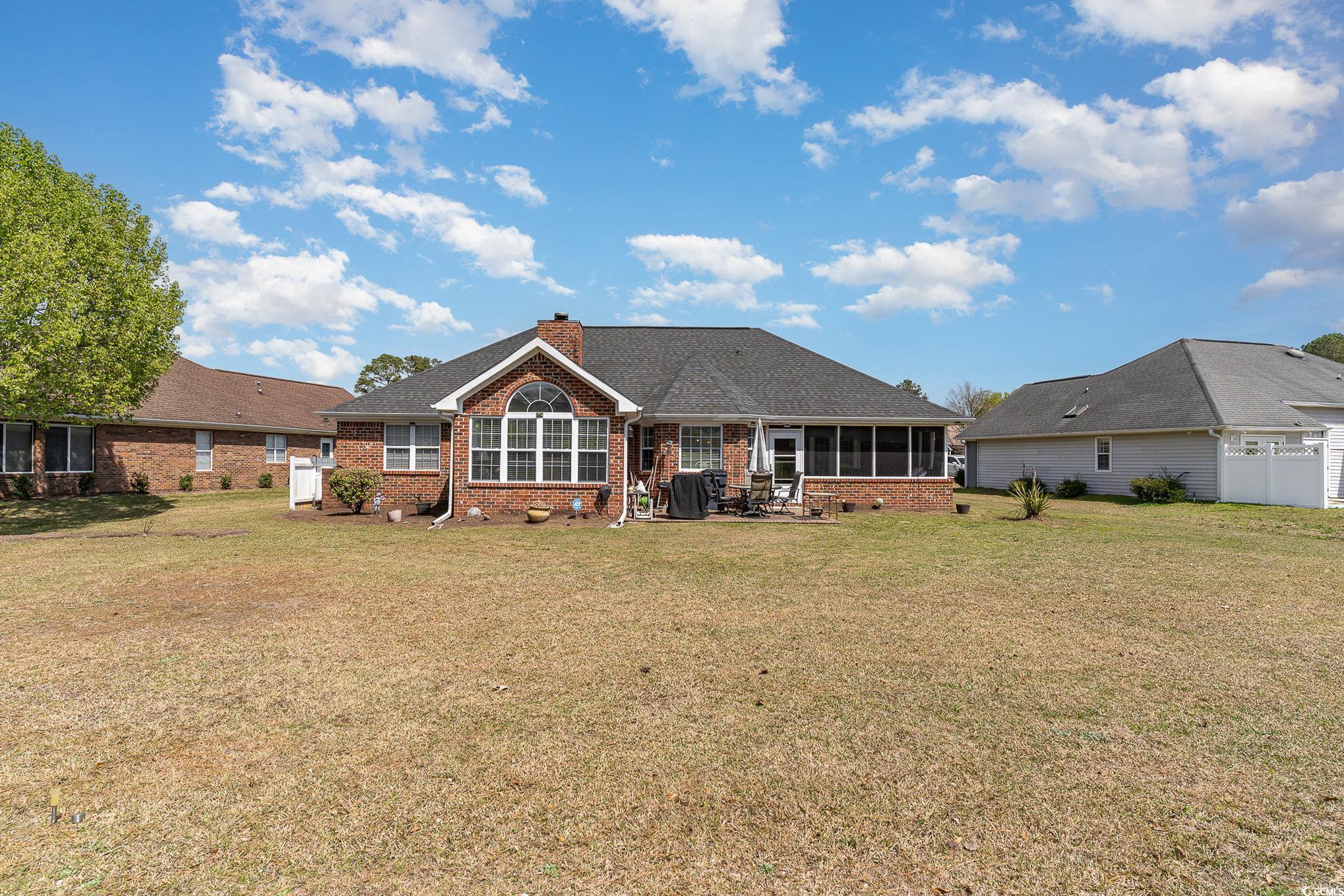 650 Bucks Trail Longs, SC 29568 - Photo 24 of 30 Rear view of property with brick siding, a shingle