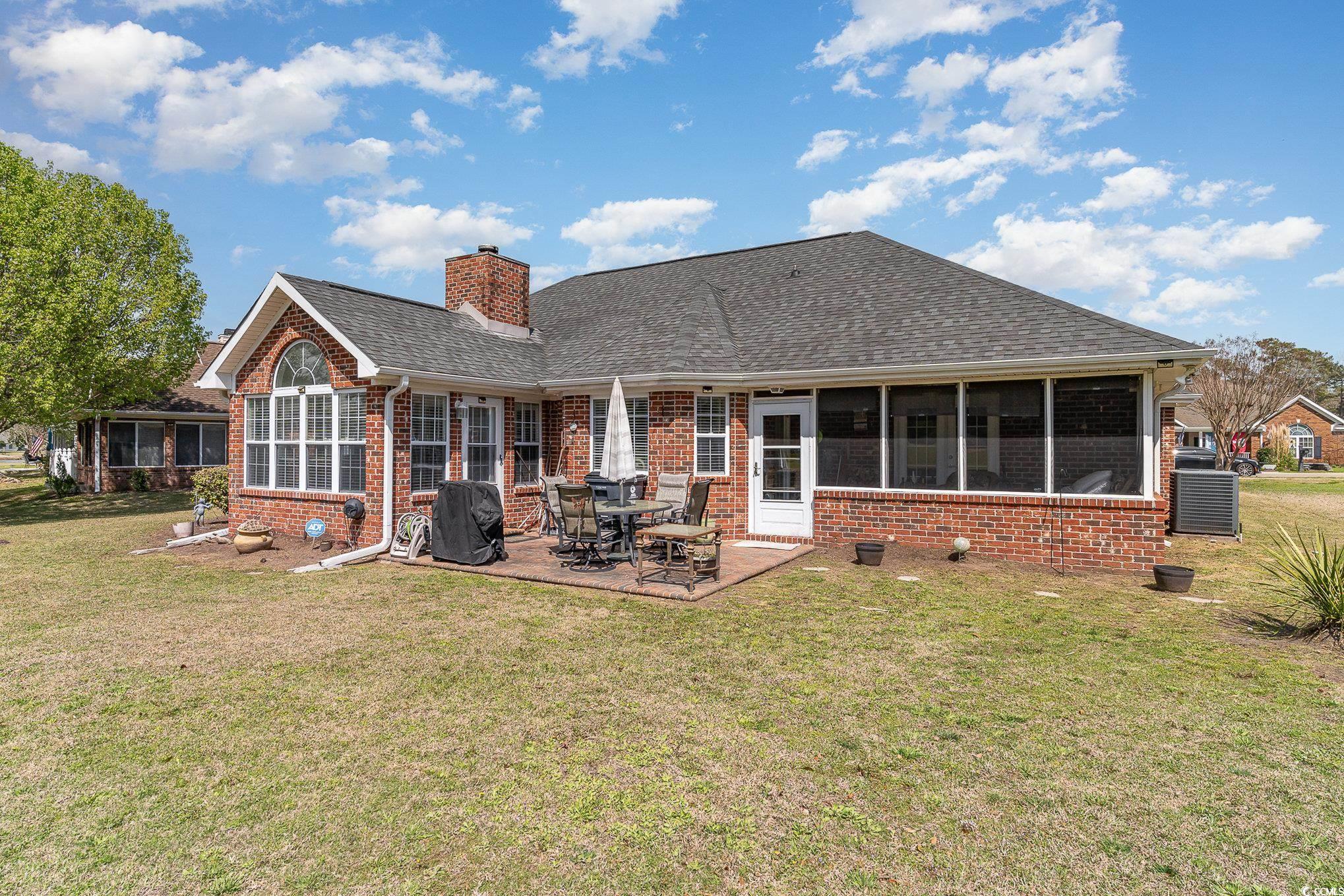 650 Bucks Trail Longs, SC 29568 - Photo 25 of 30 Rear view of property with a yard, a patio area, b