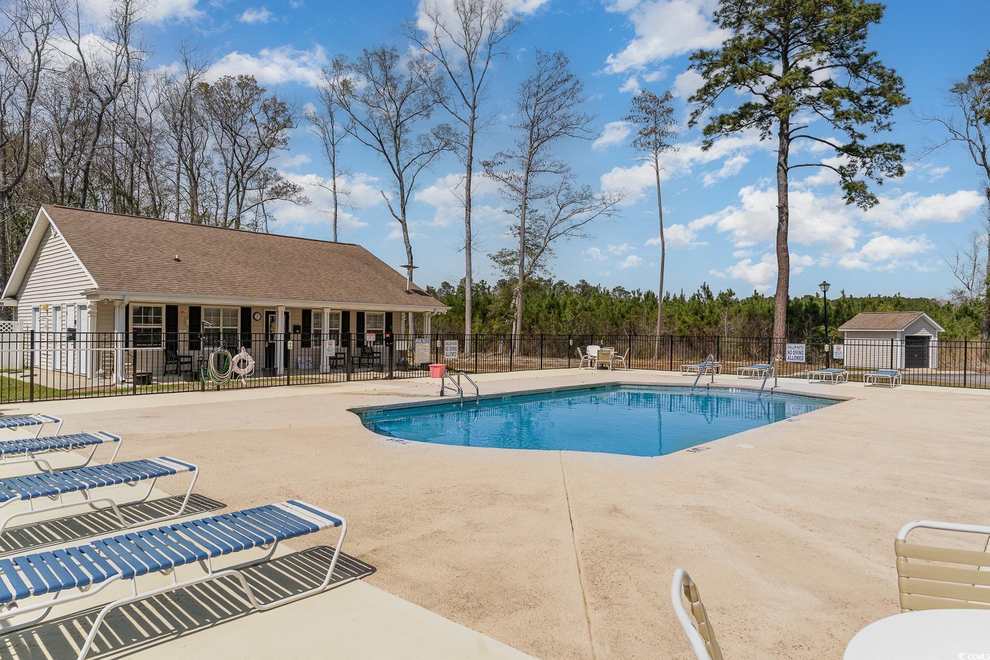 650 Bucks Trail Longs, SC 29568 - Photo 29 of 30 Pool featuring a patio and fence