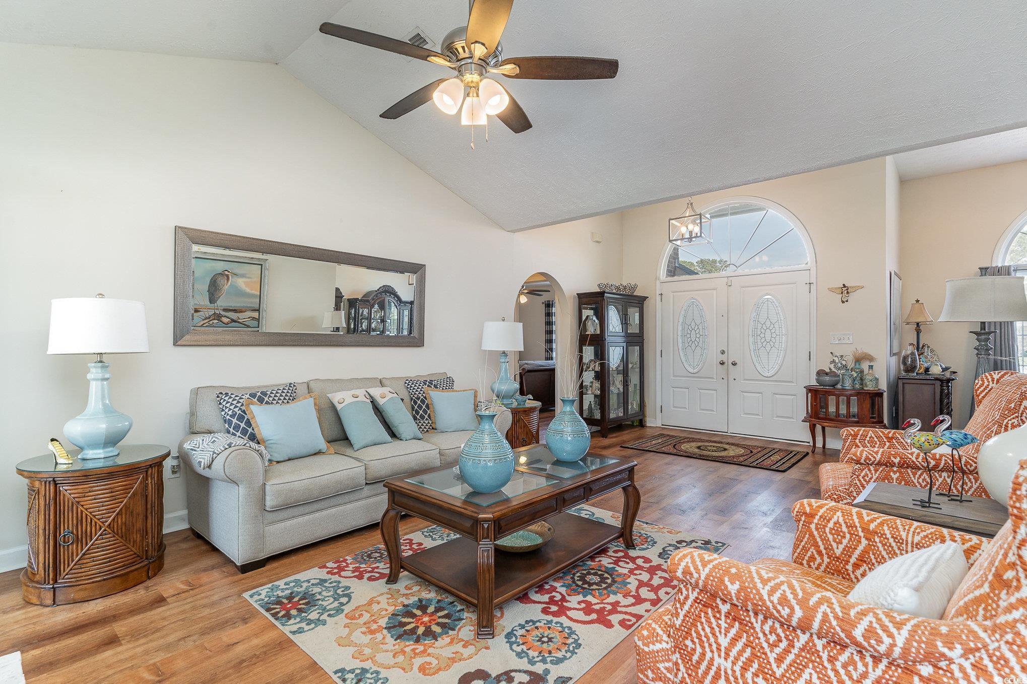 650 Bucks Trail Longs, SC 29568 - Photo 4 of 30 Living area with wood finished floors, arched walk
