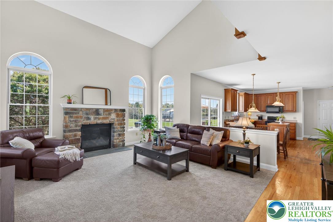 353 Farmington Road Breinigsville, PA 18031 - Photo 12 of 41 Family room with gas fireplace and soaring ceilings
