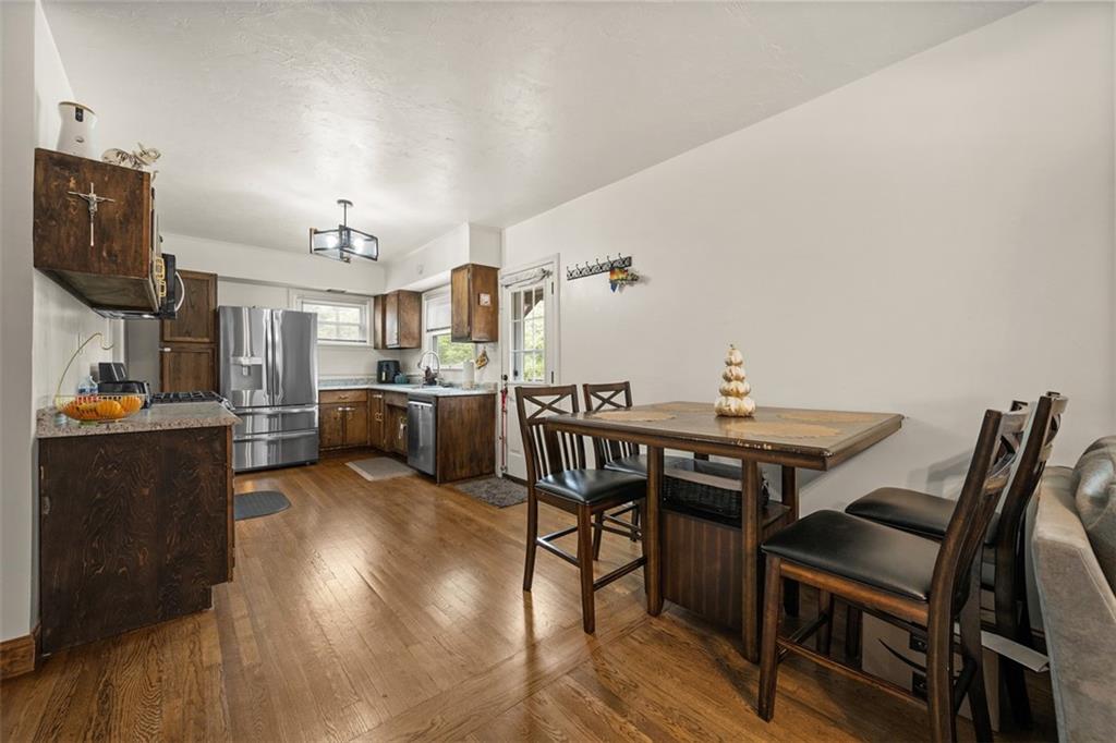 1199 Marshall Road Monaca, PA 15061 - Photo 11 of 46 a view of a dining room with furniture and wooden floor