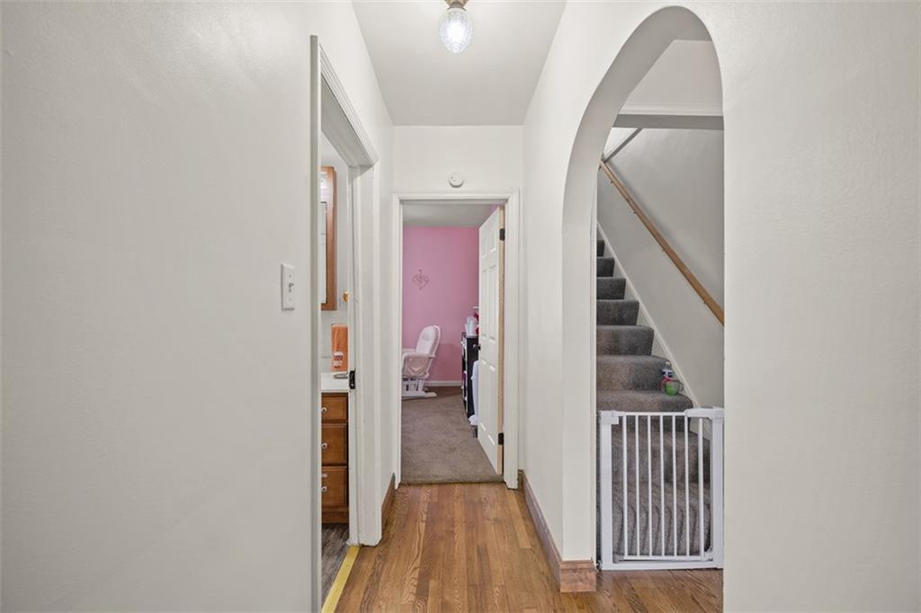 1199 Marshall Road Monaca, PA 15061 - Photo 16 of 46 a view of a hallway with wooden floor and entryway