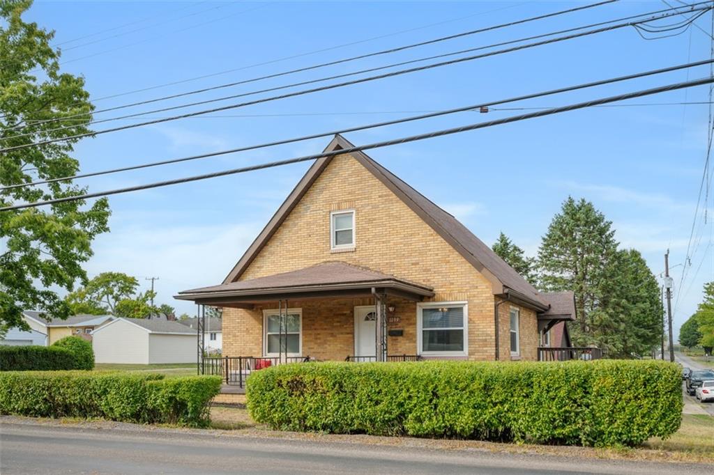1199 Marshall Road Monaca, PA 15061 - Photo 2 of 46 a front view of a house with plants and trees