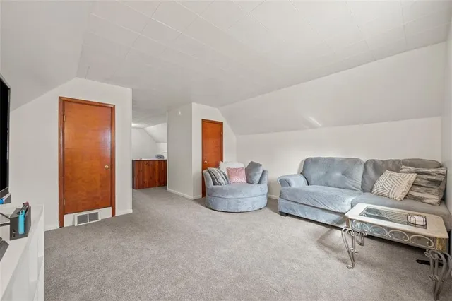 a view of empty room with closet