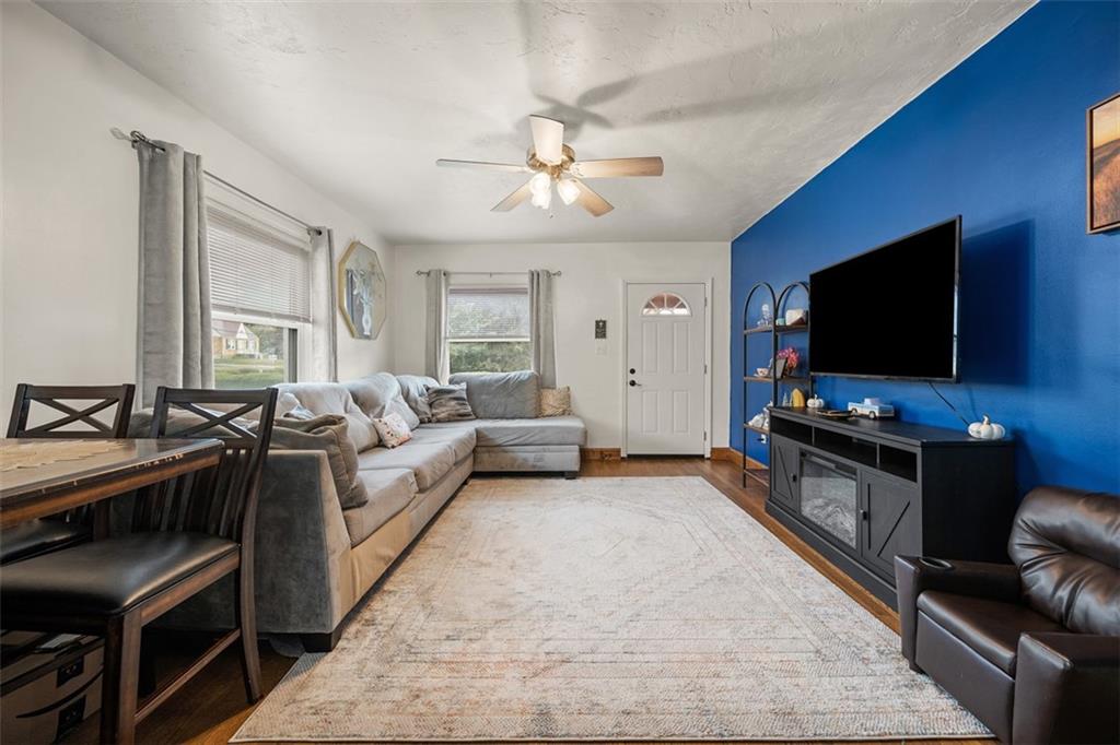 1199 Marshall Road Monaca, PA 15061 - Photo 8 of 46 a living room with furniture and a flat screen tv
