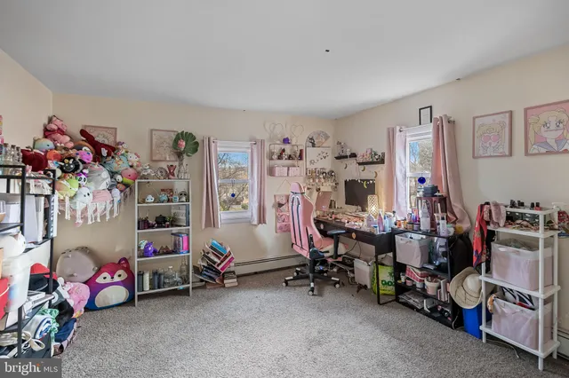 a living room with lots of furniture