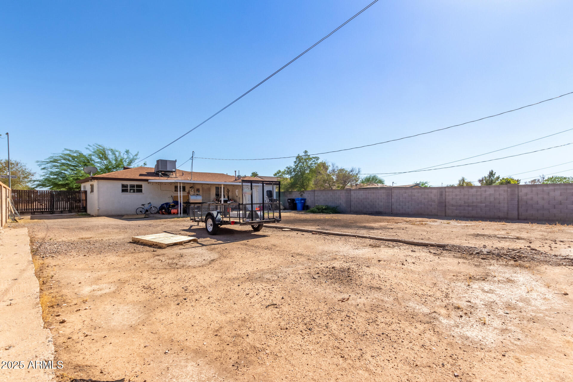 2752 West Royal Palm Road Phoenix, AZ 85051 - Photo 22 of 23 a view of a terrace with a barbeque